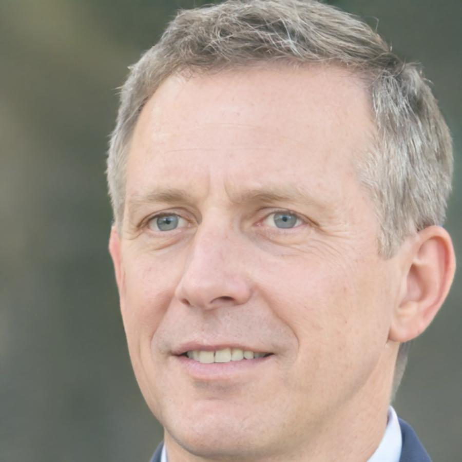 Professional headshot of Ewan client